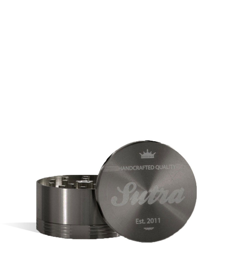 Titanium front view Sutra Vape Aluminum 4 Piece 65mm Grinder on white background